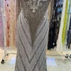 beaded gown with sheer neckline